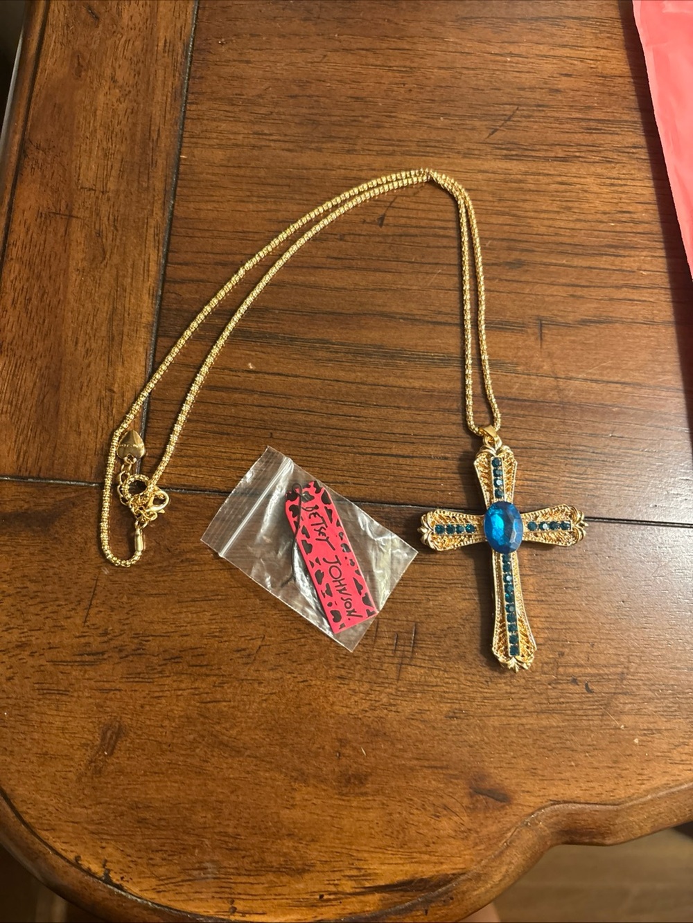 BETSEY JOHNSON LARGE PENDANT GOLD CROSS W/ BLUE CRYSTALS - GOLD PLATED